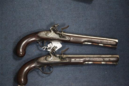 A pair of late 18th century flintlock holster pistols, 15in.